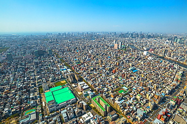 Aerial view of city skyline and rainbow bridge with Odaiba island in the background, from Tokyo Skytree observatory, the highest tower in Tokyo, Sumida District, Tokyo, Japan, Asia