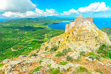 Iconic view from top of Elba mountain of Volterraio Castle on rock at 394 m, Fortress of Volterraio, symbol of Elba Island, dominates Portoferraio Gulf, Tuscan Archipelago, Tuscany, Italy, Europe