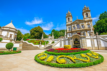 Neoclassical Basilica of Bom Jesus do Monte surrounded by gardens on a sunny day, a popular landmark and pilgrimage site, Tenoes, Braga, Minho, Portugal, Europe