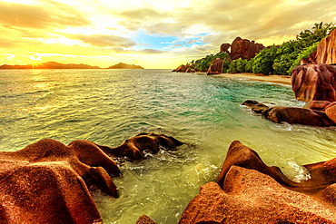 Colorful sky at twilight Anse Source d'Argent Beach, La Digue, Seychelles, Indian Ocean, Africa