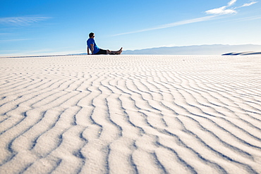 Man gazing out at the view in White Sands National Park, New Mexico, United States of America, North America