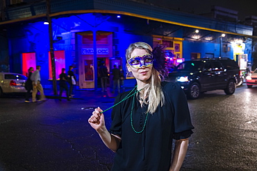 Woman ready to celebrate Mardis Gras on Frenchmen Street, the jazz district of New Orleans, Louisiana, United States of America, North America