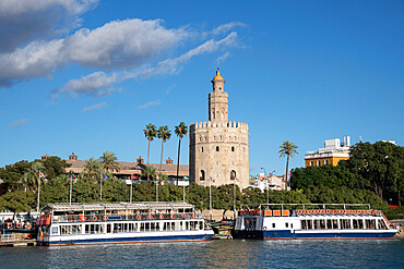 Tourist boats in front of the Torre del Oro (Gold Tower) in Seville, Andalucia, Spain, Europe