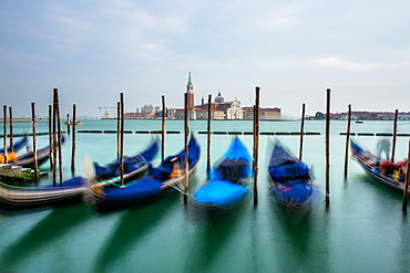 Gondolas moored in Piazza San Marco with San Giorgio Maggiore church in the background, Venice, UNESCO World Heritage Site, Veneto, Italy, Europe