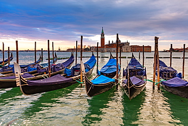 Gondolas moored in Piazza San Marco with San Giorgio Maggiore church in the background, Venice, UNESCO World Heritage Site, Veneto, Italy, Europe