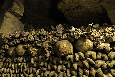 Skulls and bones that line the halls of the Catacombs, Paris, France, Europe