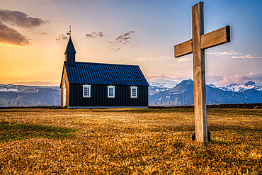 A black church known as Buoakirkja, in the Snaefellsnes peninsula at sunset, Budir, Iceland, Polar Regions