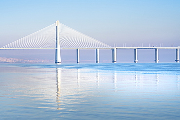 The Vasco da Gama Bridge, a cable-stayed bridge spanning the Tagus River in Parque das Nacoes (Park of the Nations), Lisbon, Portugal, Europe