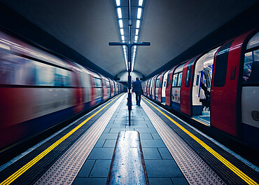 One stationary and one underground train in motion, London Tube Station, Clapham Common, Clapham, London, England, United Kingdom, Europe