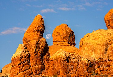 Moon view between the rocks, Arches National Park, Utah, United States of America, North America