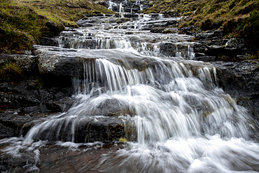 A close-up view of a cascading waterfall in the Faroe Islands, Denmark, Atlantic, Europe