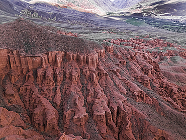 Kok-Moinok Canyon is a clay-sand structures formed on the slopes of arid mountains cut by water streams.