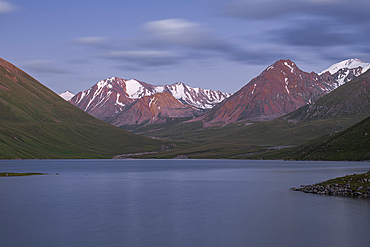 Tranquil evening at a high-altitude Kol-Ukok lake surrounded by majestic mountains in Kyrgyzstan, Central Asia, Asia