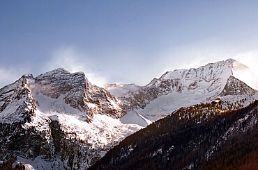 Wind gusting on Hochgall peak in winter, Trentino-Alto Adige, Italy, Europe