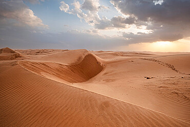 Sand dunes at sunset in the Wahiba Sands desert, Oman, Middle East