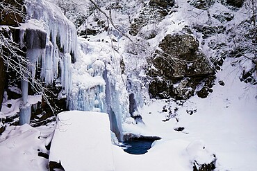 Frozen Dardagna waterfalls in winter with snow, Parco Regionale del Corno alle Scale, Emilia Romagna, Italy, Europe