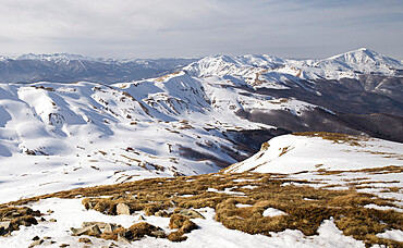 Gentle mountains fully covered by snow in the Corno alle Scale regional park, Emilia Romagna, Italy, Europe