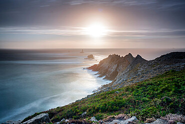 Sunset long exposure at Pointe du Raz promontory, Finistere, Brittany, France, Europe