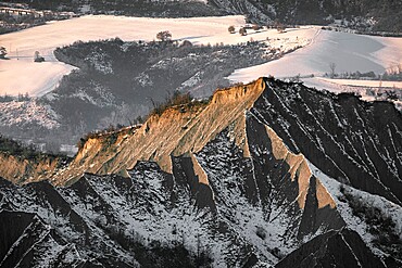 Badlands covered by the fist snow, Emilia Romagna, Italy, Europe