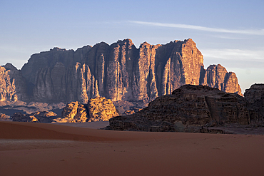 Red rocks and mountains at sunrise in the Wadi Rum desert in Jordan