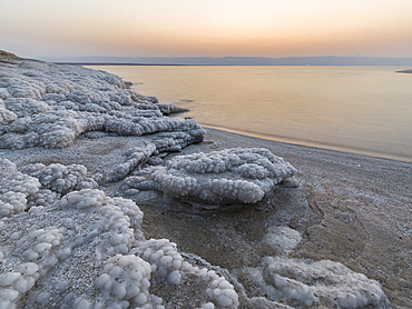 Shore with salt crystalized formation at dusk, The Dead Sea, Jordan, Middle East