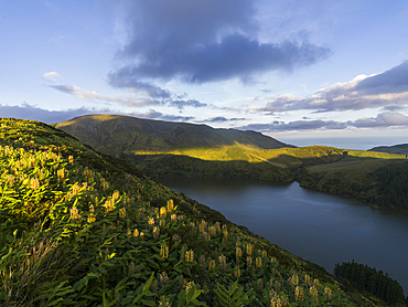 Aerial view of Caldeira Funda lake in Flores Island at sunset, Azores islands, Portugal, Atlantic, Europe