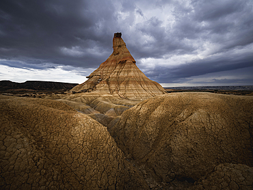 Castildetierra rock formation under a cloudy sky, the symbol of badlands of Bardenas Reales desert, Navarre, Spain, Europe