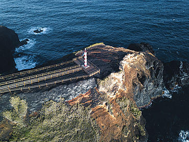 Aerial view of Farolim dos Fenais da Ajuda lighthouse on a cliff, Sao Miguel island, Azores Islands, Portugal, Atlantic, Europe