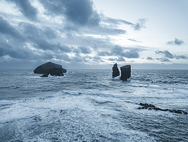 Aerial view of Mosteiros sea stacks with a stormy ocean, Sao Miguel Island, Azores Islands, Portugal, Atlantic, Europe