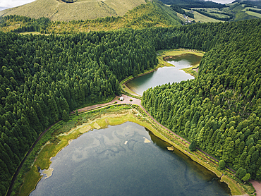 Aerial view of Lagoa Empadadas, Lagoa do Eguas and Lagoa Rasa lakes with low clouds and pine trees forest, Sao Miguel island, Azores islands, Portugal, Atlantic, Europe