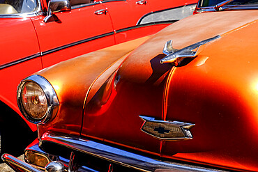 Close view of hood and hood ornament on a vintage car, Havana, Cuba, West Indies, Central America