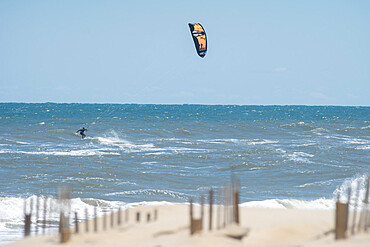 Kiteboarder Ian Brown in Atlantic Ocean waves off Nags Head, North Carolina, United States of America, North America