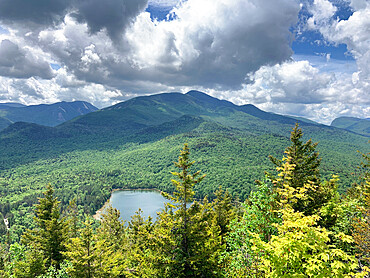 Clouds over High Peaks of the Adirondack Mountains and Heart Lake near Lake Placid, New York State, United States of America, North America