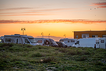 Motorhomes and camper vans on a service area at sunset, Andalusia, Spain, Europe