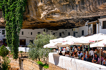 Street with white houses under a rock in Setenil de las Bodegas, Pueblos Blancos region, Andalusia, Spain, Europe