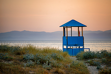 Beach watch tower at sunset on a wild beach, Sardinia, Italy, Mediterranean, Europe