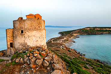 San Giovanni di Sinis historic tower, drone aerial view of San Marco Cape at sunset, Sardinia, Italy, Mediterranean, Europe