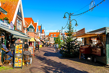 Volendam main street with traditional Dutch houses and shops, Volendam, North Holland, The Netherlands, Europe