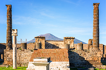 Pompeii archaeological site of ancient city with Mount Vesuvius volcano on the background in Naples, Italy