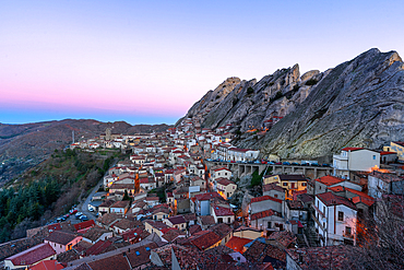 Pietrapertosa historic village with stone houses in the mountains at sunrise, in Italy