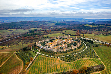 Monteriggioni historic village on top of the hill drone aerial view in Tuscany, Italy