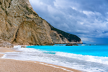 Porto Katsiki beach with turquoise water in Lefkada island on a cloudy day, in Greece