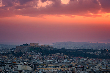 Athens city at sunset with Parthenon and Acropolis seen from Lycabettus hill viewpoint in Greece