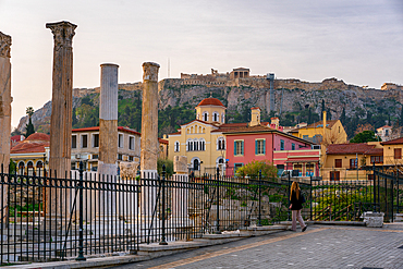 Hadrians Library ancient greek buildings with Parthenon Athens Acropolis on top of the hill in Greece