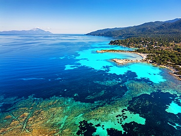 Karydi beach with turquoise water drone aerial view, in Greece