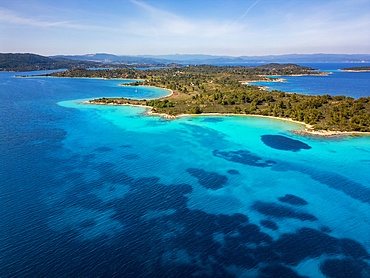 Diaporos island with wild beaches with turquoise water drone aerial view in Greece