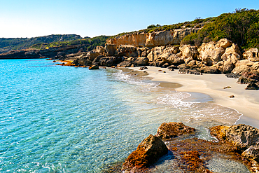 Petrified forest Agia Marina Agios Nikolaos Geopark beach with turquoise water in the south of Greece