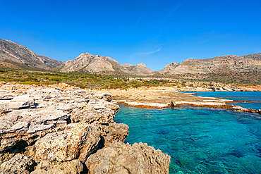 Petrified forest Agia Marina Agios Nikolaos Geopark beach with turquoise water in the south of Greece