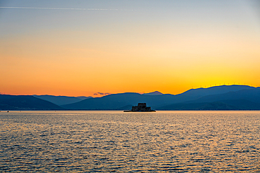 Nafplion bourtzi castle island at sunset in Greece