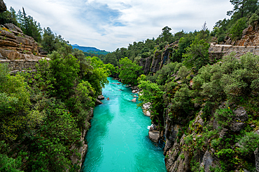 Koprulu canyon with turquoise water between the trees in Turkey